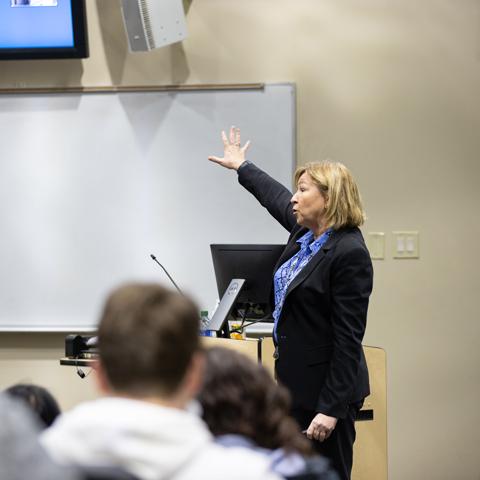 Speaker in front of a class